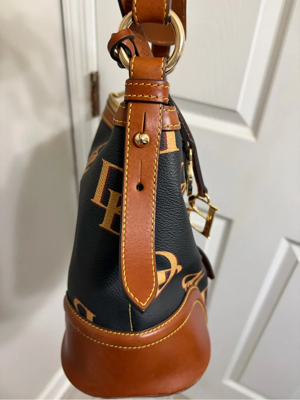 Dooney & Bourke Black and Brown DB Logo Hobo with Gold Hardware